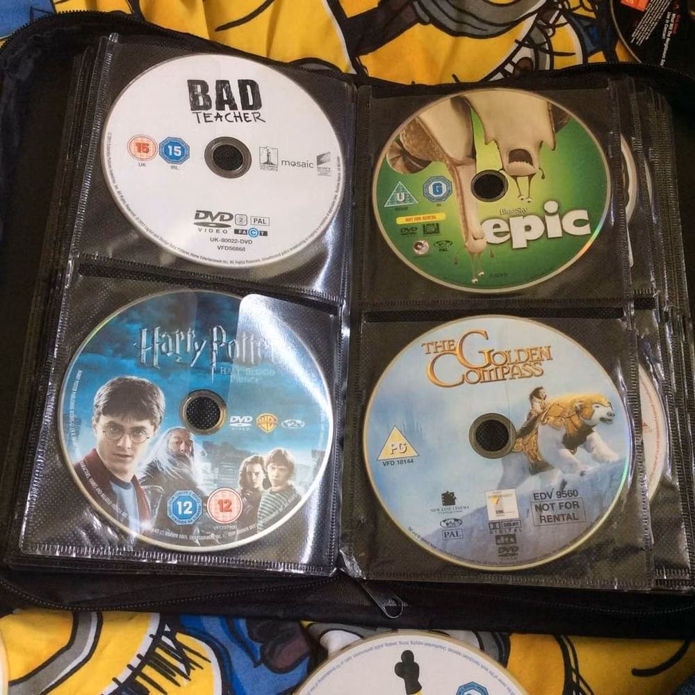 early 2000s DVD cases collection photograph -