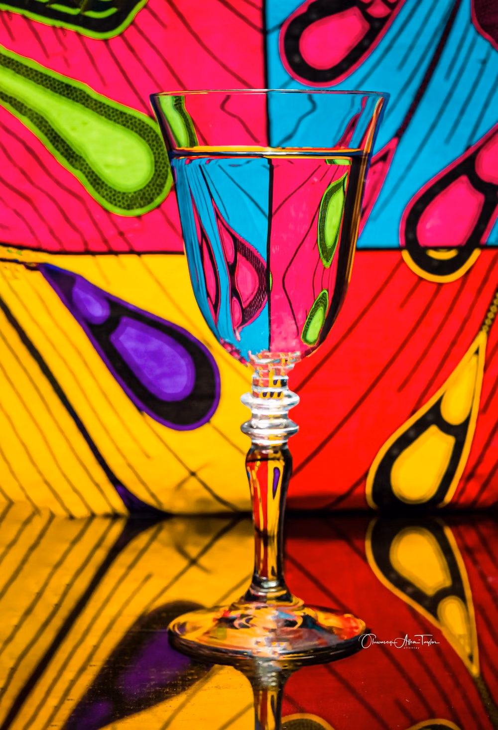 distorted glass liquid refraction photograph - Interesting distortions of patterns can appear when you place them behind any clear container with water. Water + Glass Cup + Pattern = REFRACTION D500 + Sigma Art 18-35mm 1.8 Godox AD600 PRO with 56cm Beauty Dish. Photo created by me but, inspired by one of Gavin Hoey Video tutorials