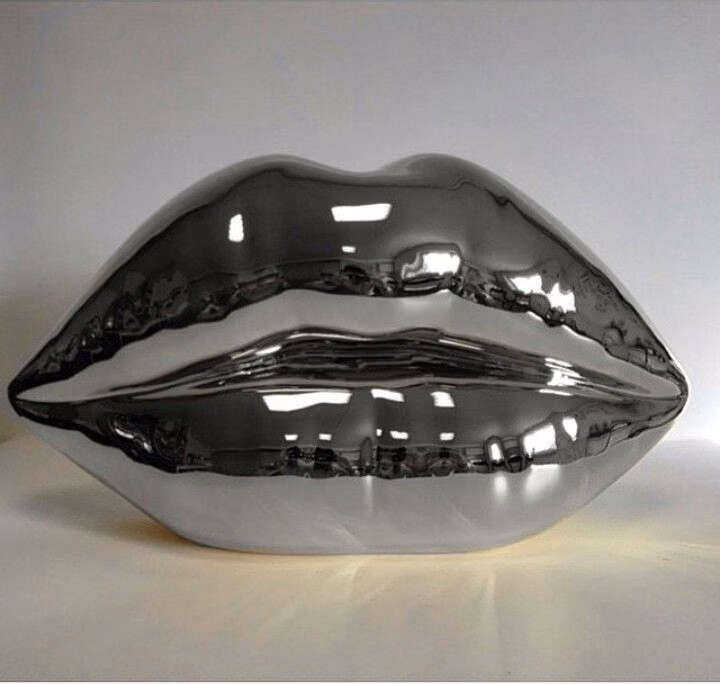 chrome inflated object studio photograph -