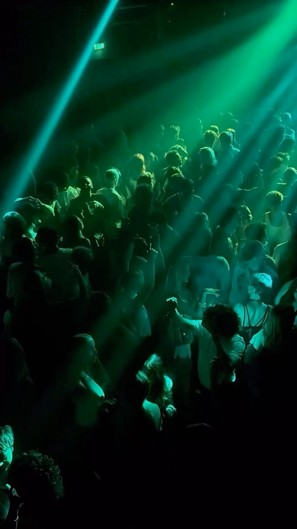 nightclub laser strobe crowd photograph -
