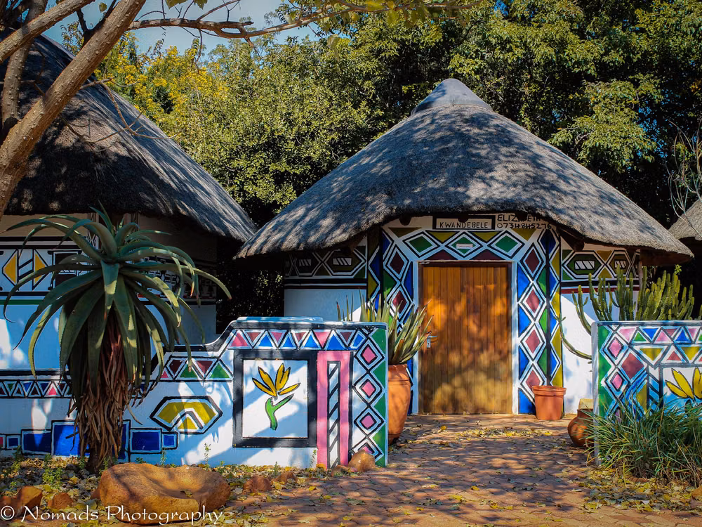 Ndebele geometric painted house photograph - PTA Botanical Gardens - Part 2 The garden, which is surrounded by urban development, offers a much-needed green area and corridor for wildlife in the eastern suburbs of Pretoria.