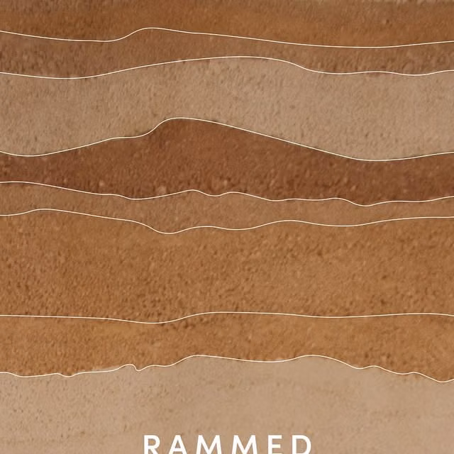 rammed earth wall layers close up photograph - Pablo Luna Studio on Instagram: "Rammed earth is an ancient building technique that involves compacting layers of soil, sand, clay, and in some cases lime, into a formwork to create solid, durable, and thermally efficient walls. In Bali, this method has regained value within the context of regenerative design and conscious architecture.
The earth used can be sourced locally, reducing the carbon footprint of transportation and allowing each wall to speak of the land it comes from its color, texture, and geological story. This living material breathes, regulates humidity, and offers ideal thermal mass for tropical climates.
When integrated with other natural materials such as bamboo, coconut wood, or volcanic stone, rammed earth enables a dialogue between elements that are not only sustain