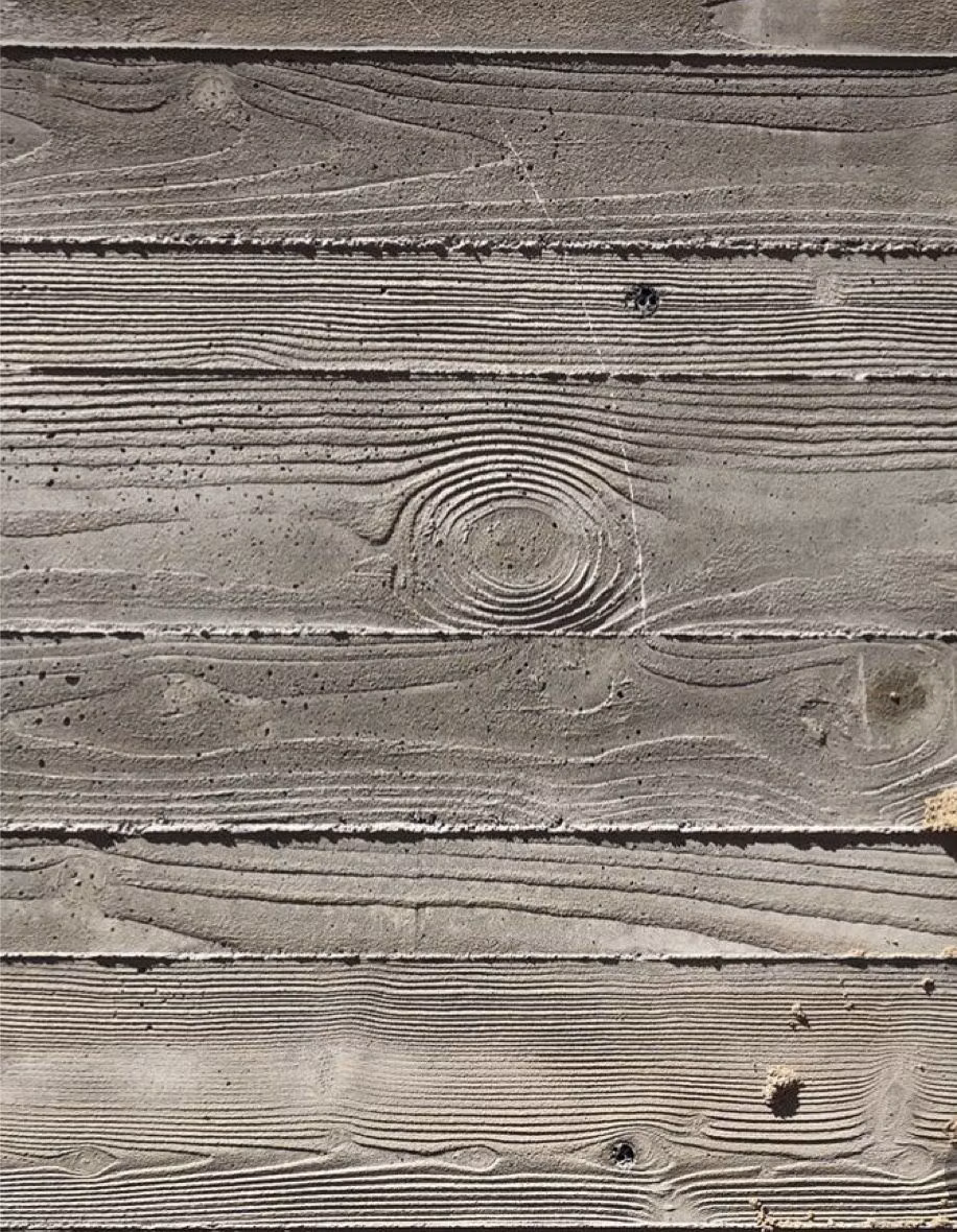 board formed concrete texture close up photograph - 