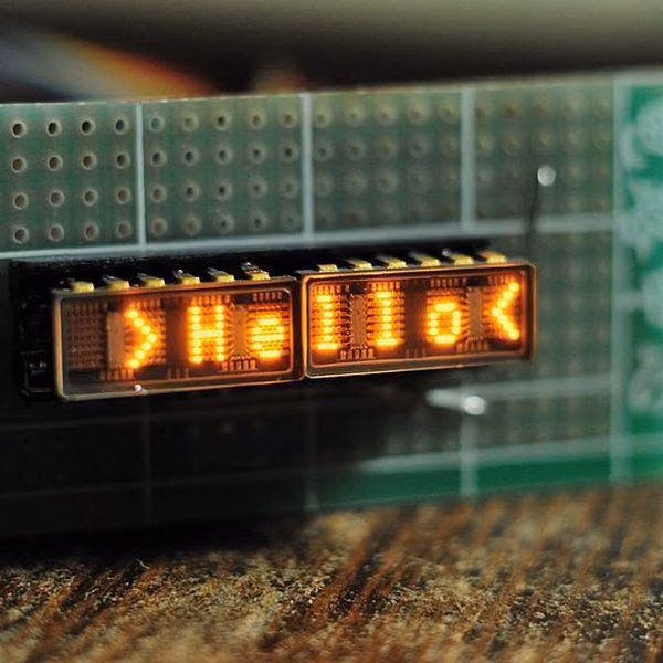 dot matrix equipment label close up photograph - Source and datasheets linked below I found these QDSP-2273 displays and was interested in trying to drive them. A lot of info about them here: http://www.industrialalchemy.org/articleview.php?item=750 [http://www.industrialalchemy.org/articleview.php?item=750]  I found a snippet of example code at: http://huinink.info/hdsp2003/ [http://huinink.info/hdsp2003/] and decided to write a full driver library for it. The driver will show static text, scrolling text, and 'hacker' text like this: https://