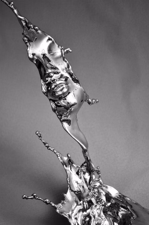 Chrome / Liquid Metal aesthetic -