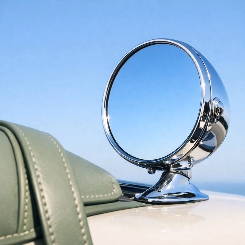 vintage chrome car bumper reflection close up - A nod to the past, moving towards the horizon. The allure of the open road, captured in a single, silent reflection. Explore the collection: www.lestylenu.com/room-fragrances #LeStylenu #QuietLuxury #VintageMotion #SkyBlue