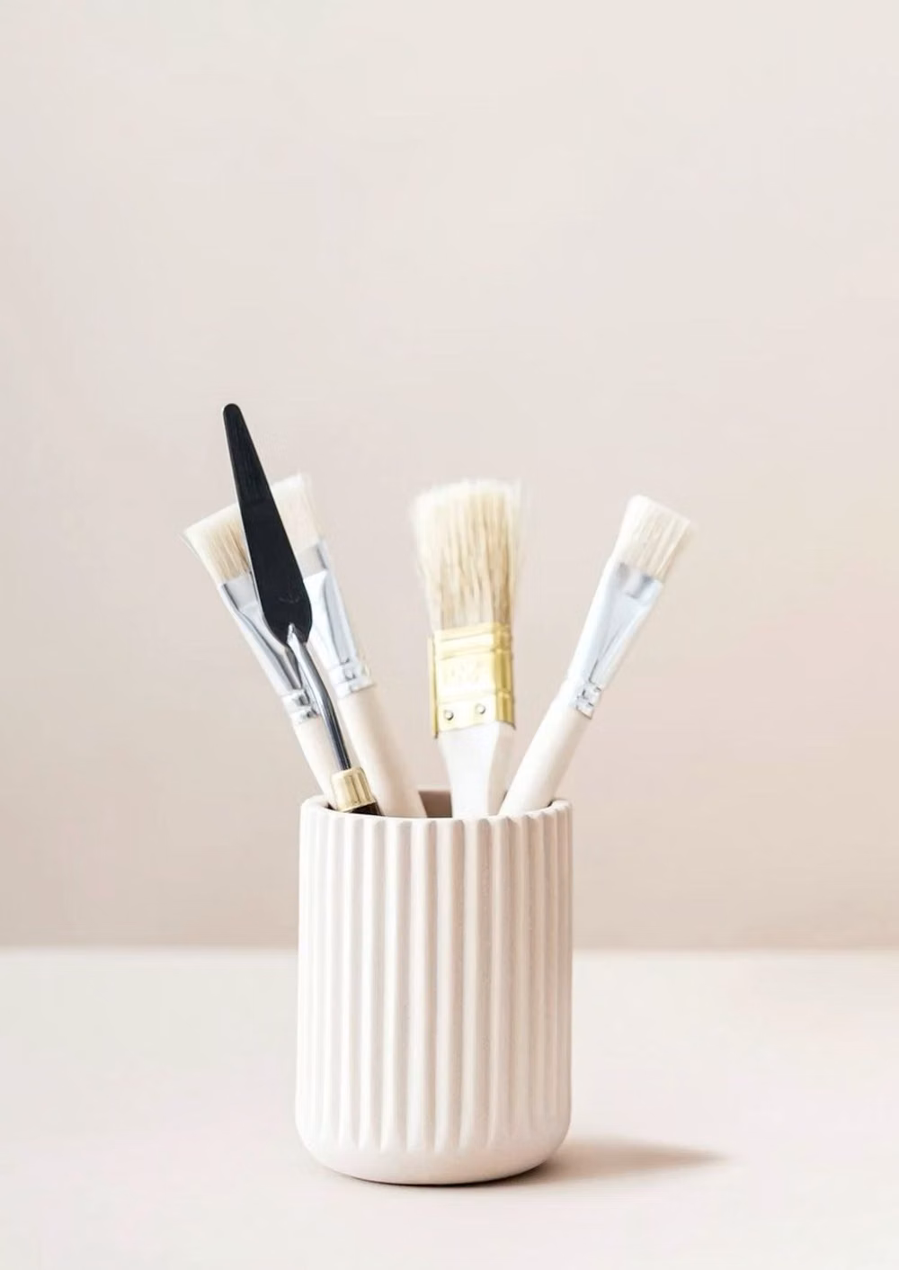 bookbinding paste brush and glue pot workspace photograph -