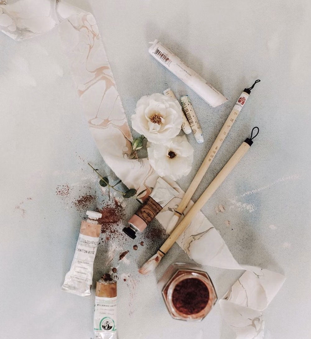 bookbinding paste brush and glue pot workspace photograph -