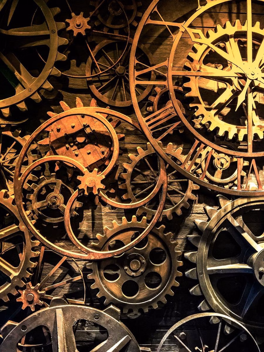 large industrial gears close up photograph -