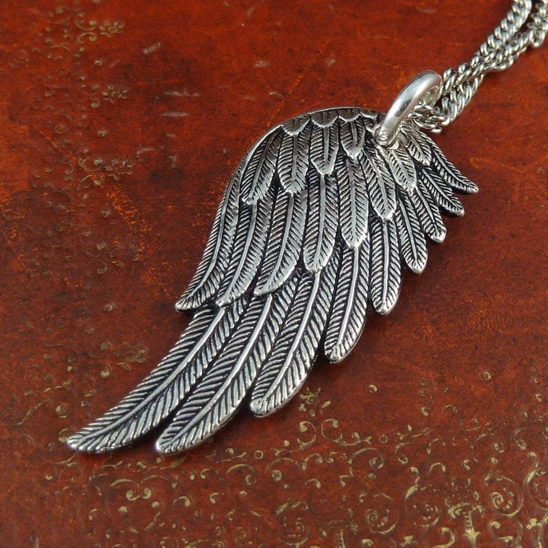 silver angel wing charm macro photograph - Angel+Wing+Necklace+Antique+Silver+Angel+Wing+by+LostApostle,+$55.00