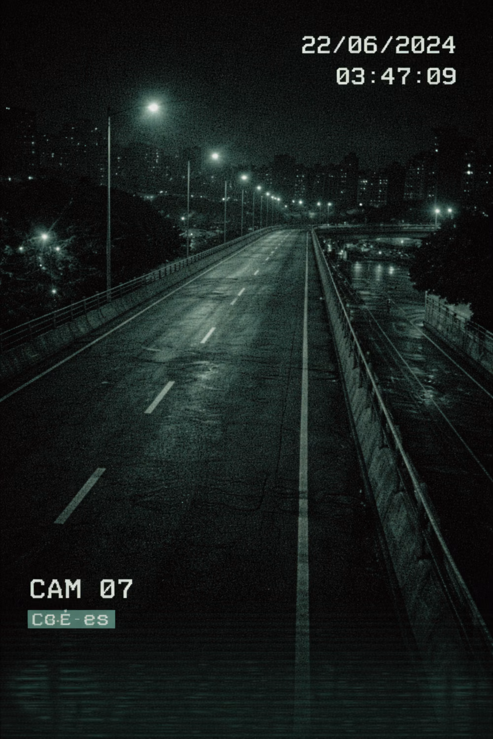 urban surveillance camera night photograph - A public surveillance camera overlooking an empty city overpass. No traffic. No pedestrians. Streetlights illuminate a road that feels disconnected from time. The city is awake, but no one is present. #foundfootage #cctvfootage #liminalspace #urbanoverpass #emptycity #nightrecording #analoghorror #urbanvoid #backrooms #weirdcore #surveillancecamera #liminalnight #darkaesthetic
