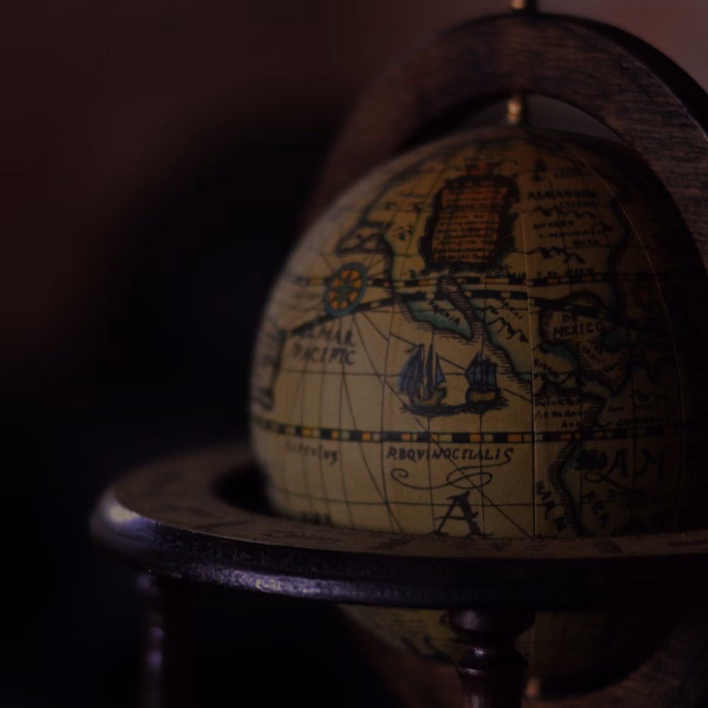 antique globe dark wood room photograph -