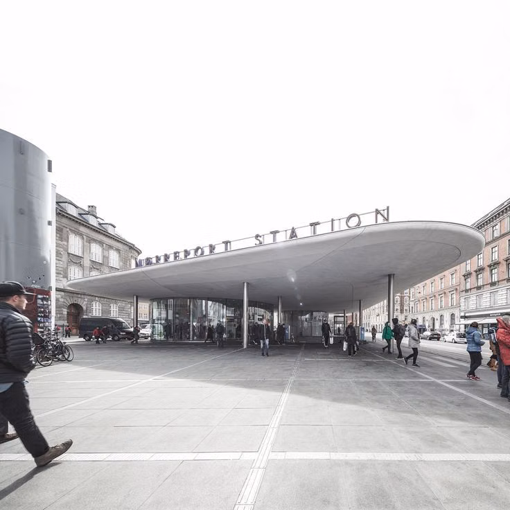 white concrete transit station hard sunlight photograph - 