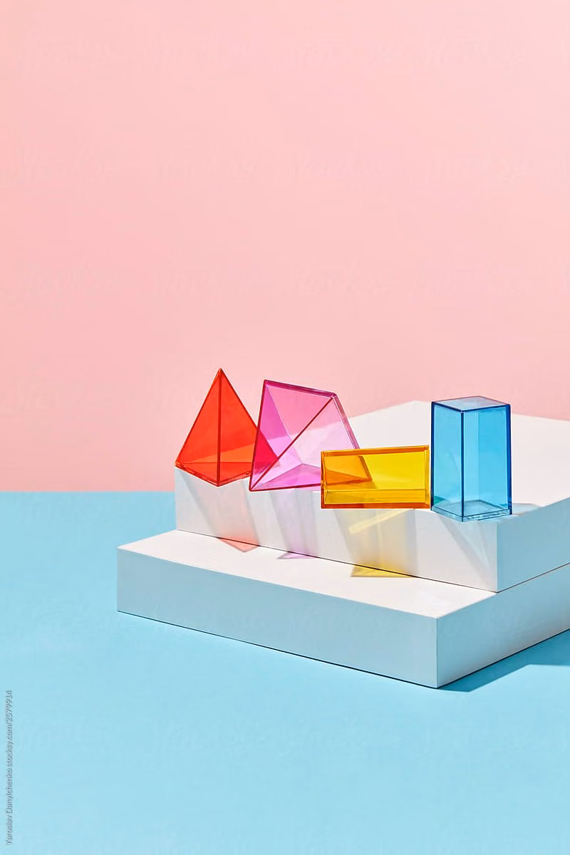 translucent plastic geometric objects studio photograph - 