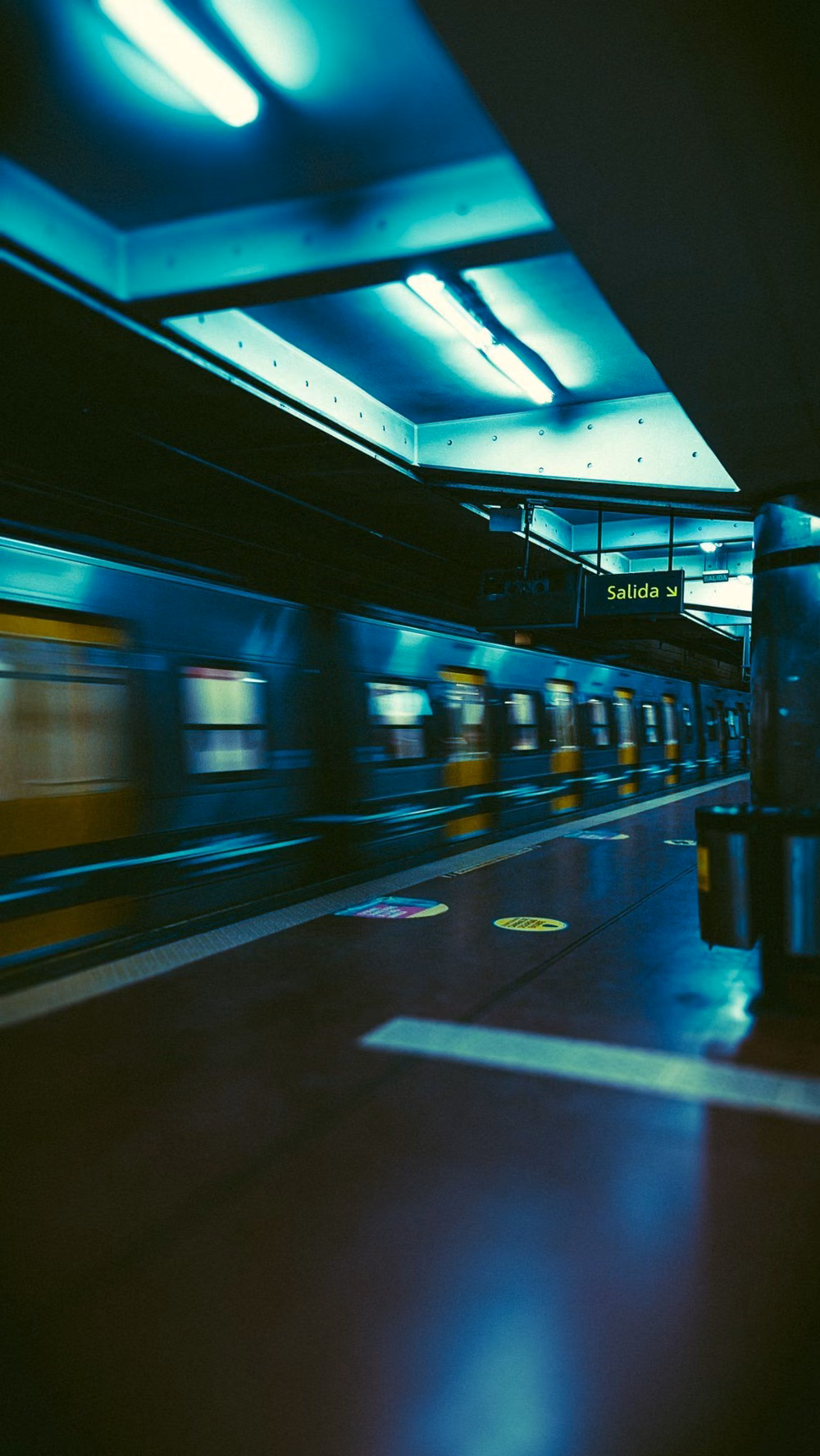fluorescent train platform night photograph -