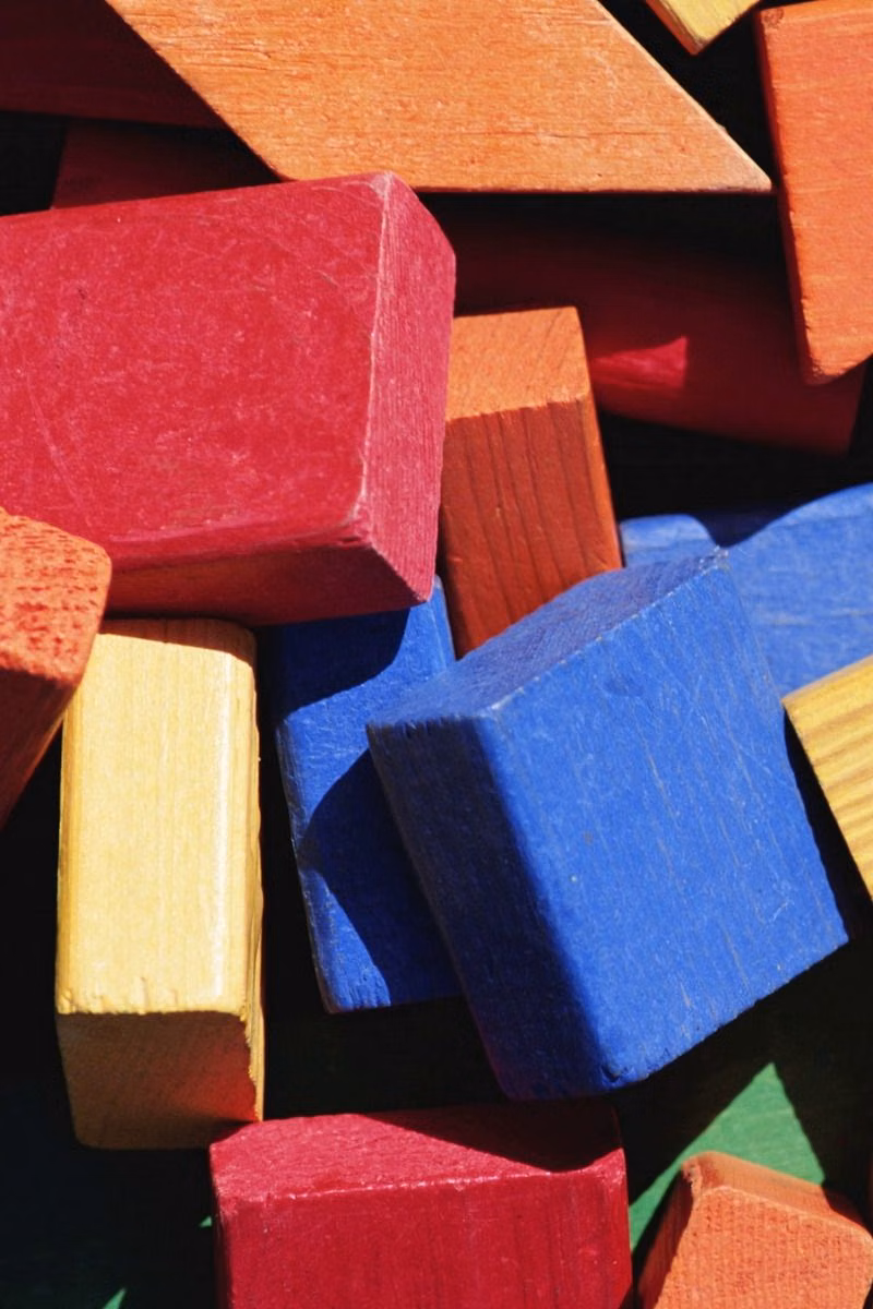 primary color geometric wooden blocks photograph - 