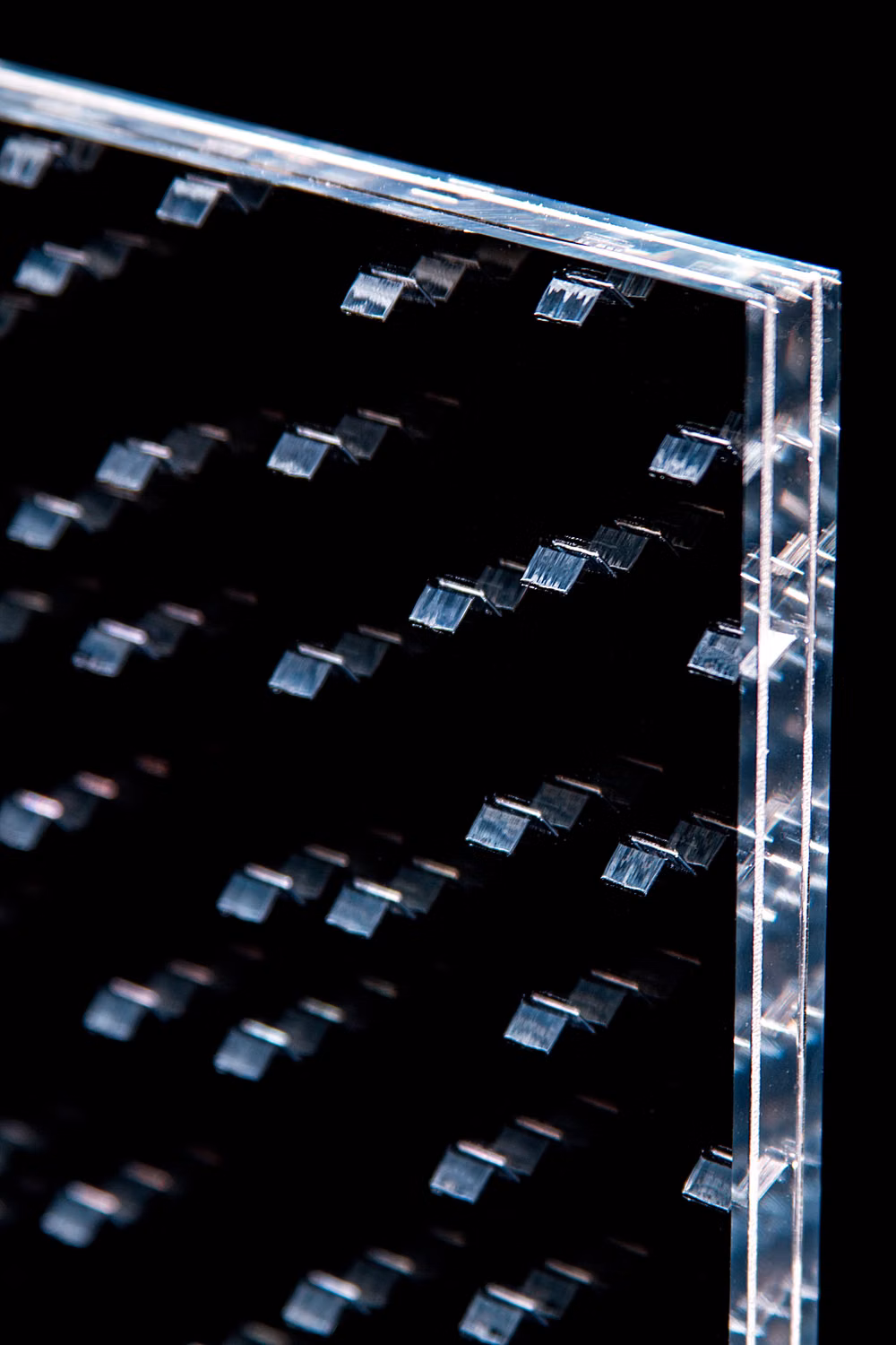 stacked clear glass sheets edge close up - Sensitile infintiy™ sample corner detail.