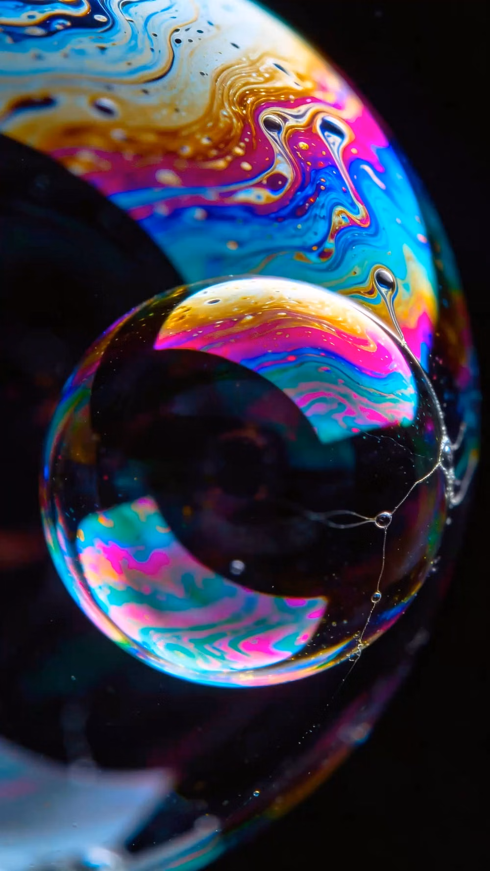 soap bubble iridescence macro photograph -
