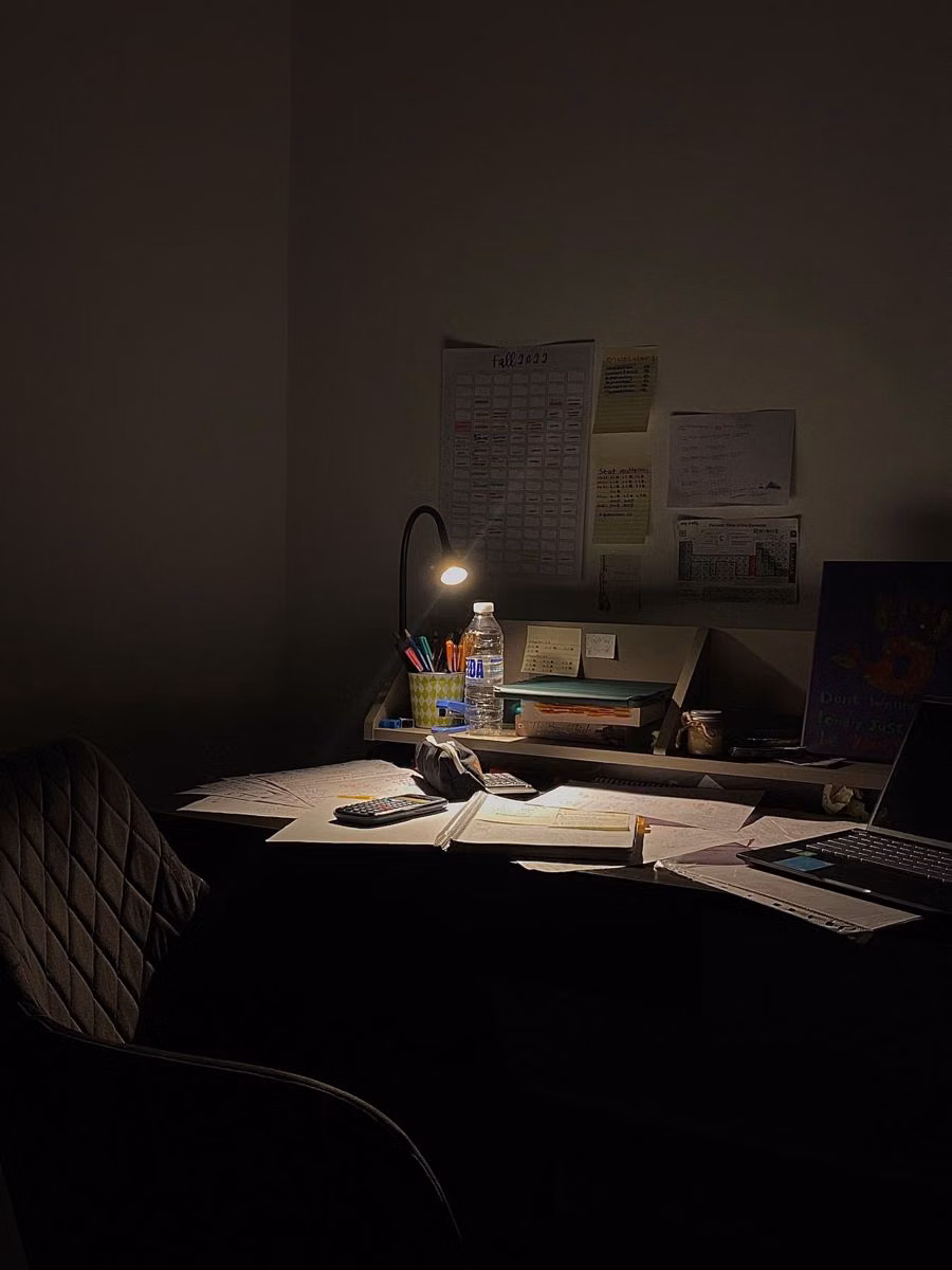 desk lamp study corner night photograph -