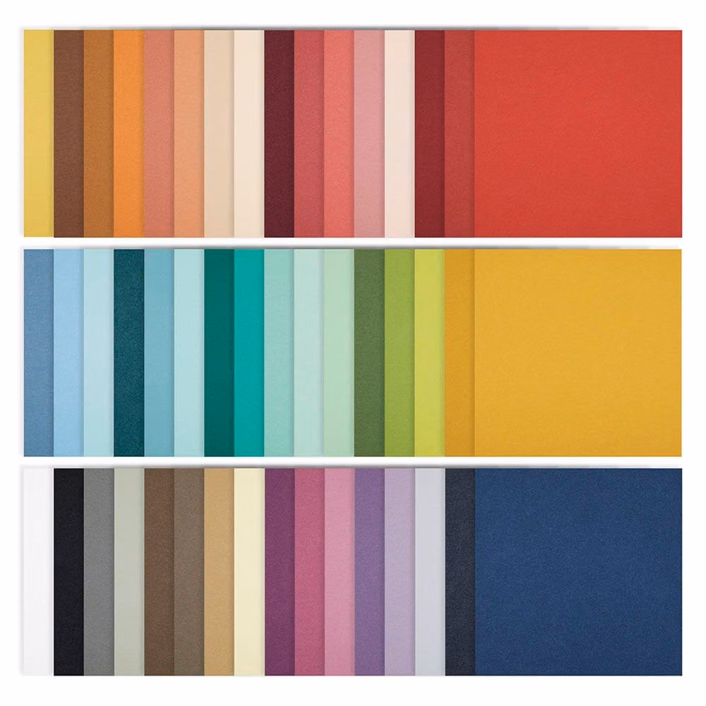 stacked colorful cardstock paper sheets side view photograph - The Full 48 12" x 12" Cardstock Pack from Spellbinders