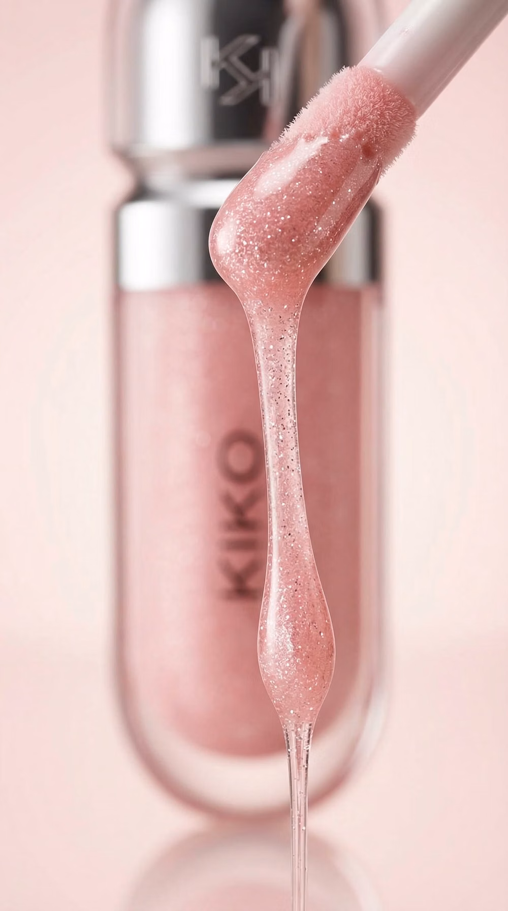 pink glitter lip gloss product photograph -