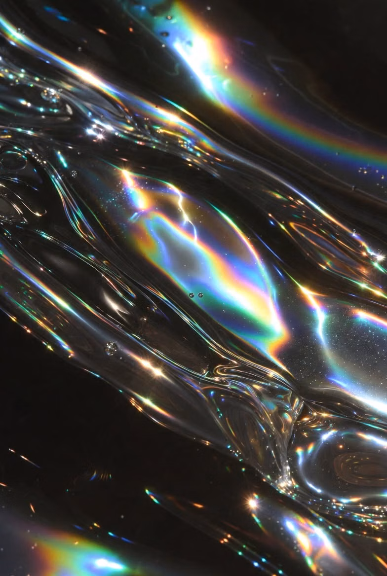 oil film rainbow gradient macro photograph -