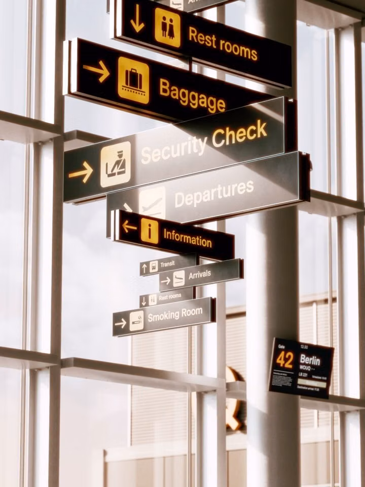 airport wayfinding typography sign photograph - WOUQ (@wearewouq) • Instagram photos and videos