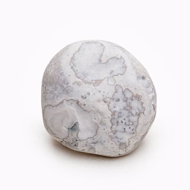 single stone on sand minimal photograph - Rob Whitworth on Instagram: "The Smaller Bigger Picture 32.
Art in nature. Beach finds. The beauty of nature. Beach pebbles. Beach stones. British beaches. Close up photography. Found objects. Geology. Rocks. Pebble. Stone. Hidden art. Inspired by nature. Look closer. Looking closer. Looking in detail. Mindful. Mindfulness. Minimal. White background. Image isolated. Natural inspiration. Naturally inspired. Nature in close up. Macro photography. Natural patterns. Patterns in nature. Beach treasures. Small things of delight. Textures in nature. Natural textures. Pebble collection. Pebble collector. Beachcomber. Beachcombing. Coastal inspired. Inspired by the coast. Inspired by the sea. Creative minimalism. Intimate landscape. Natures colours. Natures colors. Natural colours. Natural colors.