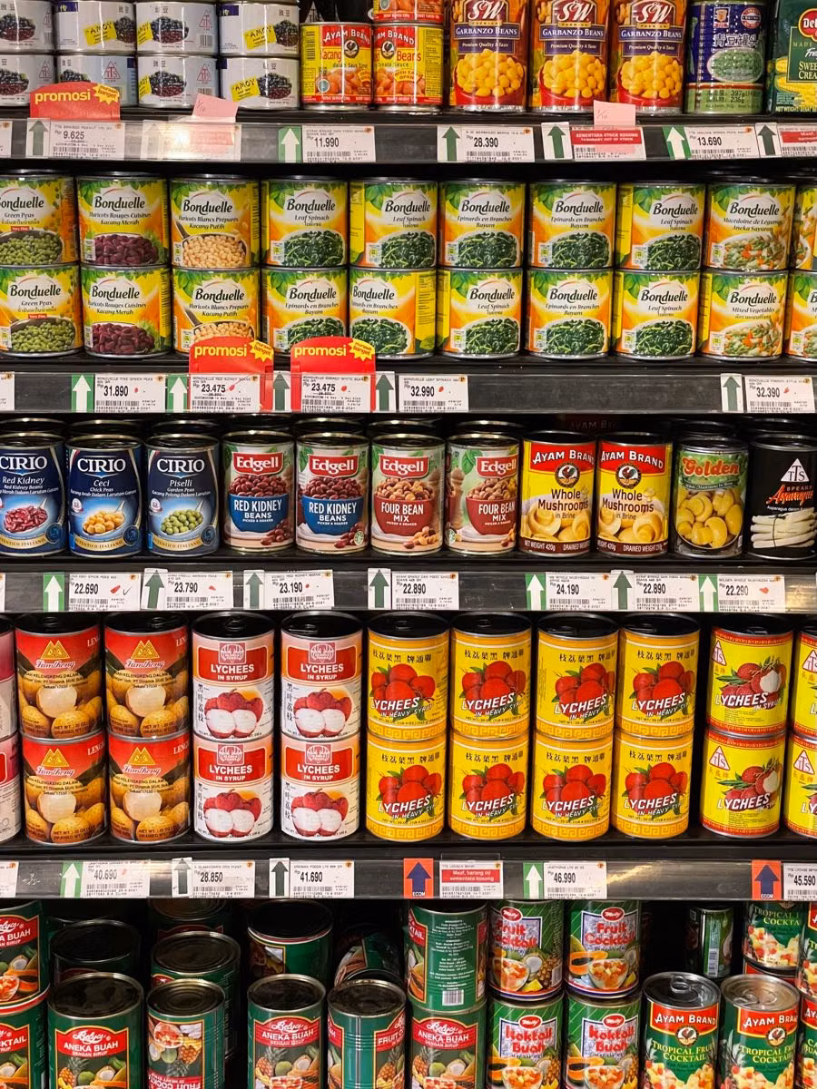 colorful supermarket cans shelf photograph -