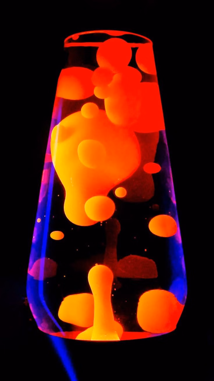 lava lamp bubbles close up photograph -