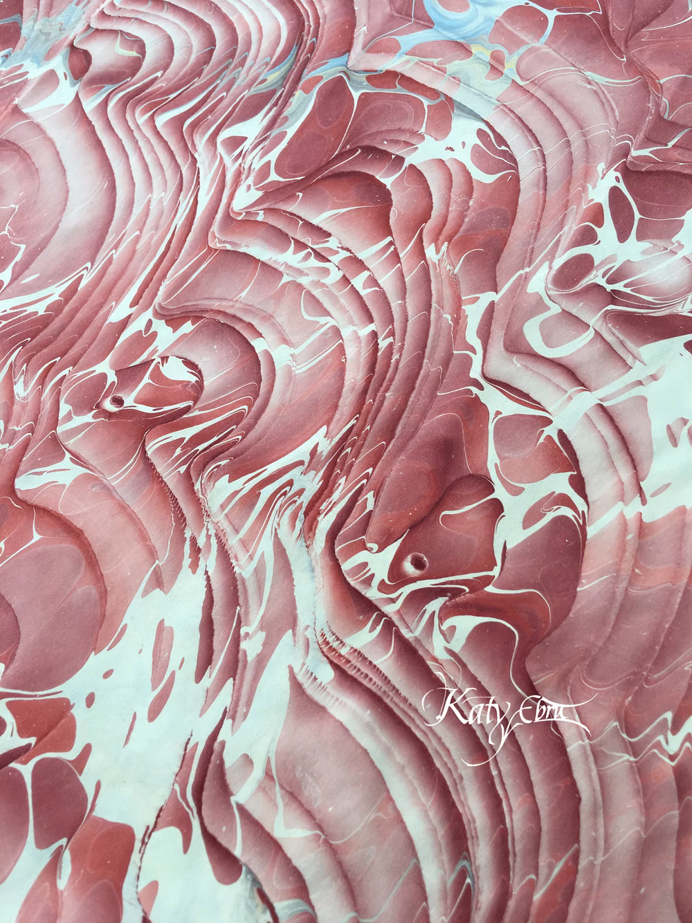 swirling marbled paper macro photograph -