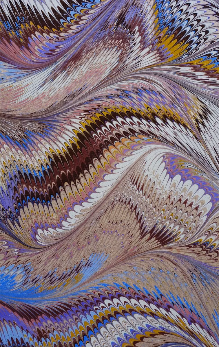 swirling marbled paper macro photograph -