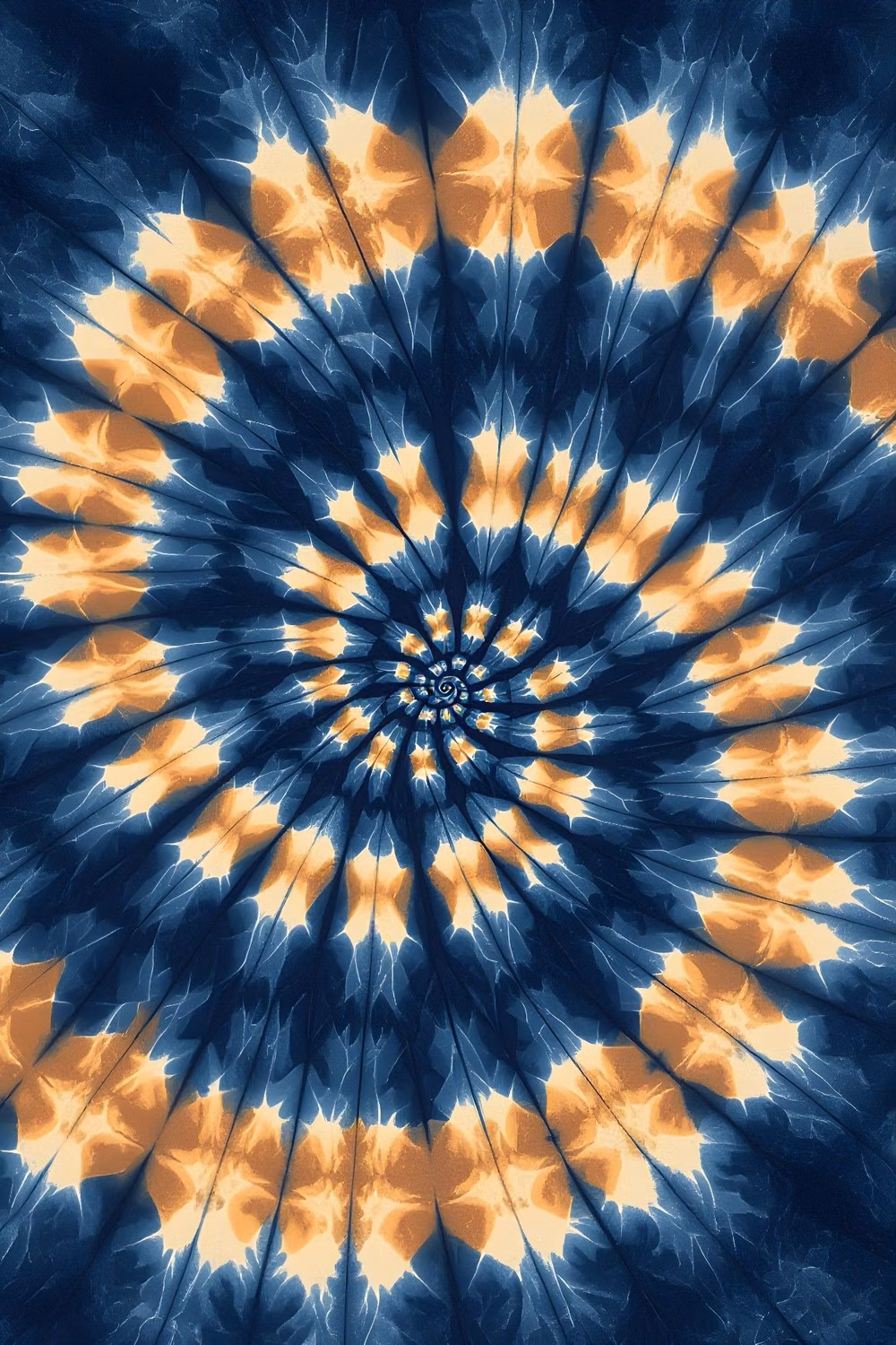 tie dye fabric spiral close up photograph -
