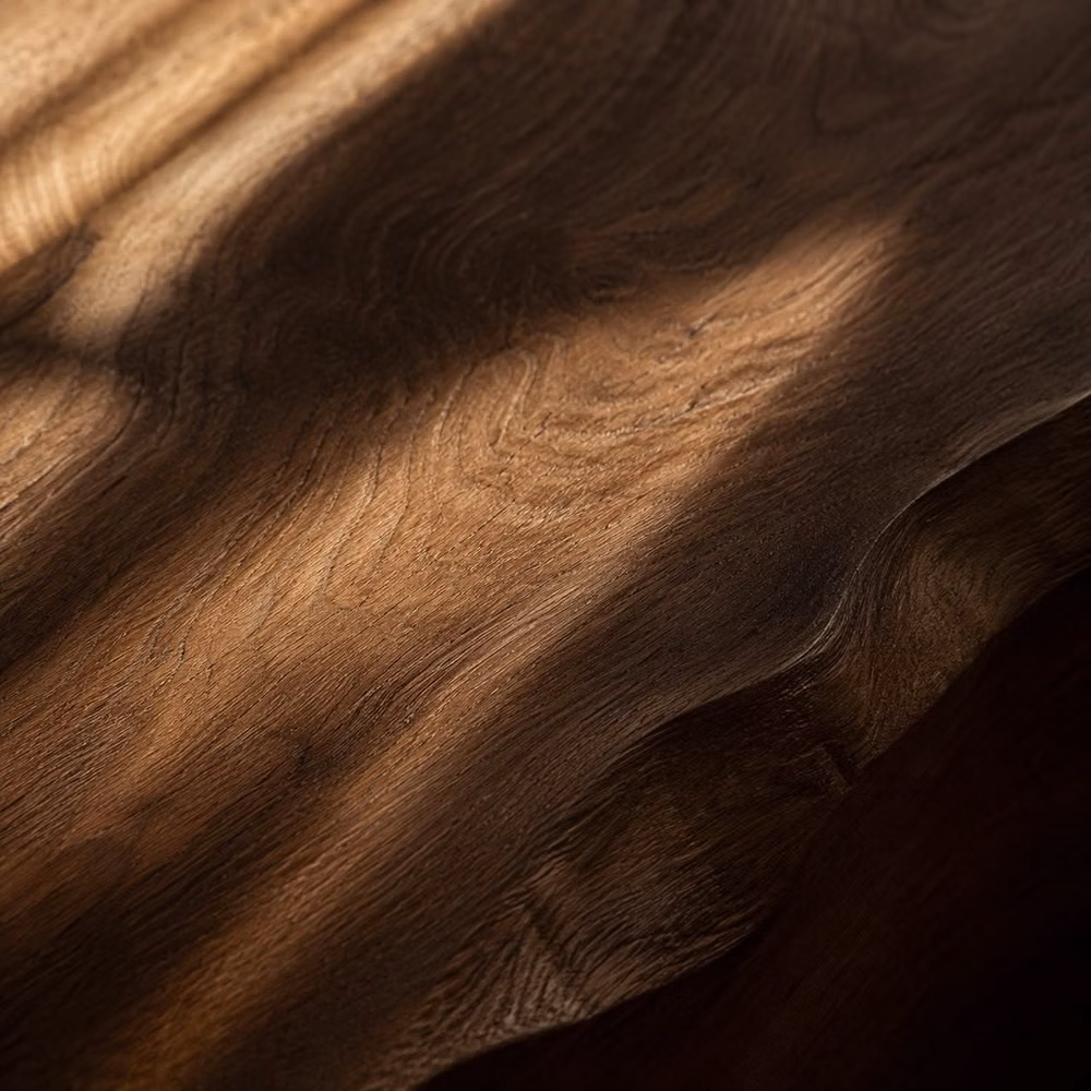 dark walnut wood grain luxury close up - Surfaces you can almost feel. Wood, shadow, depth, and warmth. the kind of details that make a space feel intentional. Would you use this tone in your space?