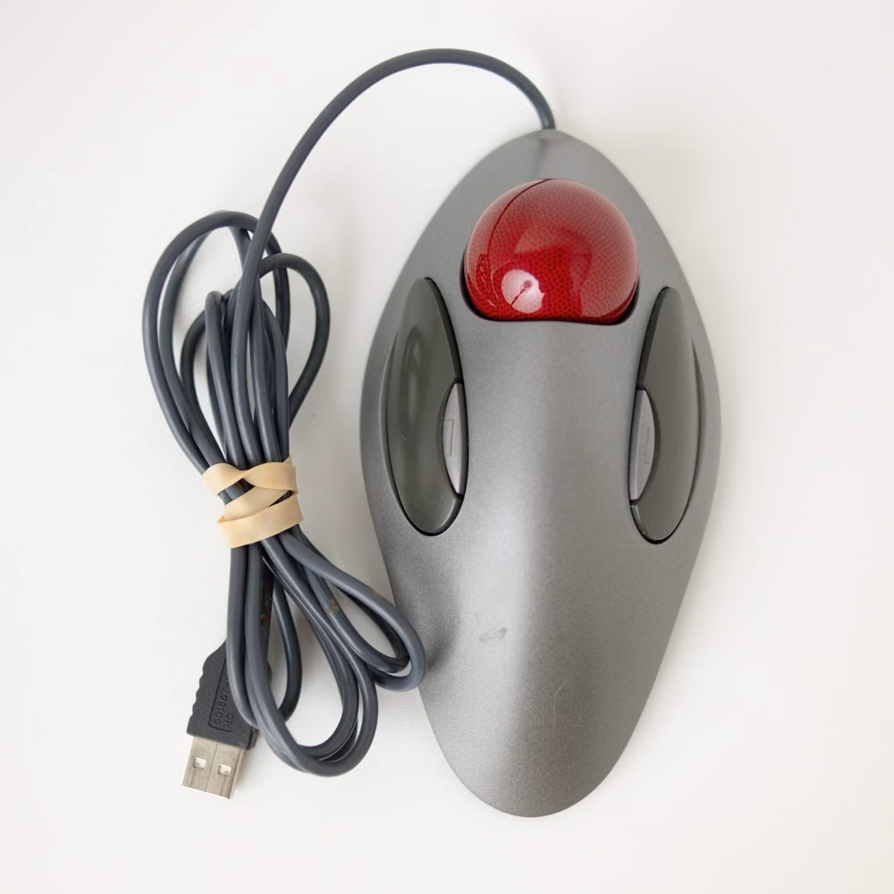 vintage trackball mouse product photograph - Logitech Marble Mouse, Trackball Mouse, Wired Usb, Ambidextrous Design, Red Trackball, Grey Computer Mouse, Ergonomic Mouse, Vintage Tech, Retro Computing, Office Peripheral Condition: Tested Great Pre-Owned Condition. See Photos For Mini Scratch. I Carefully Examine, Measure, Photograph, And Store My Items In A Smoke Free Environment. I Do My Best To Describe And Measure Them Accurately. For Clothing Items, If You Aren't Sure About The Size, Lay Flat An Item Of Your Own And Compare Your Measurements With Mine. Super Fast Shipping! Items Typically Ship Same Or Next Business Day After Payment (Unless I Happen To Be Out Of Town). Let Me Know If You Have Any Questions, I'm Happy To Answer