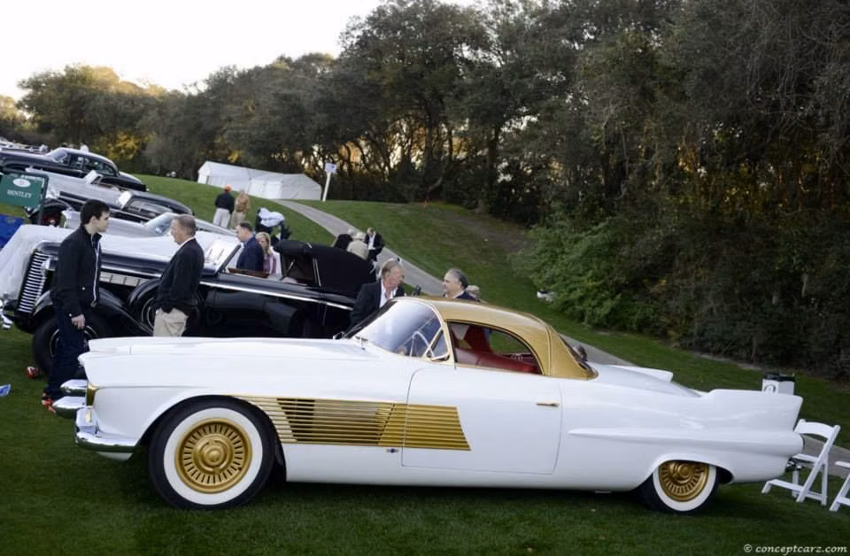 1950s futuristic concept car photograph - 1955 Cadillac Elegante Special by Rocco Motto In the early 1950s Harry Birdsall, a commercial artist and Joe Mascari, a New York contractor, devised a futuristic luxury two-seater based on a 1953 chassis and running gear featuring a unique two-piece folding convertible hardtop. They named their creation the 'Elegant'. http://www.conceptcarz.com/z23796/Cadillac-Elegant-Special.aspx