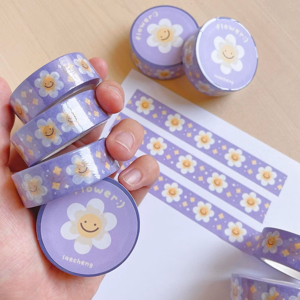 colorful washi tape rolls overhead photograph - washi tapes i have designed! my favorite ones are the sunrise, sunset ones, i’ve already gone through multiple rolls of them 😊 let me know which one is your favorite hehe 🏷️ #washitape #washi #washiaddict #washitapeaddict #cuteart #aestheticart #cozyart #stationery #stationeryaddict #illustration