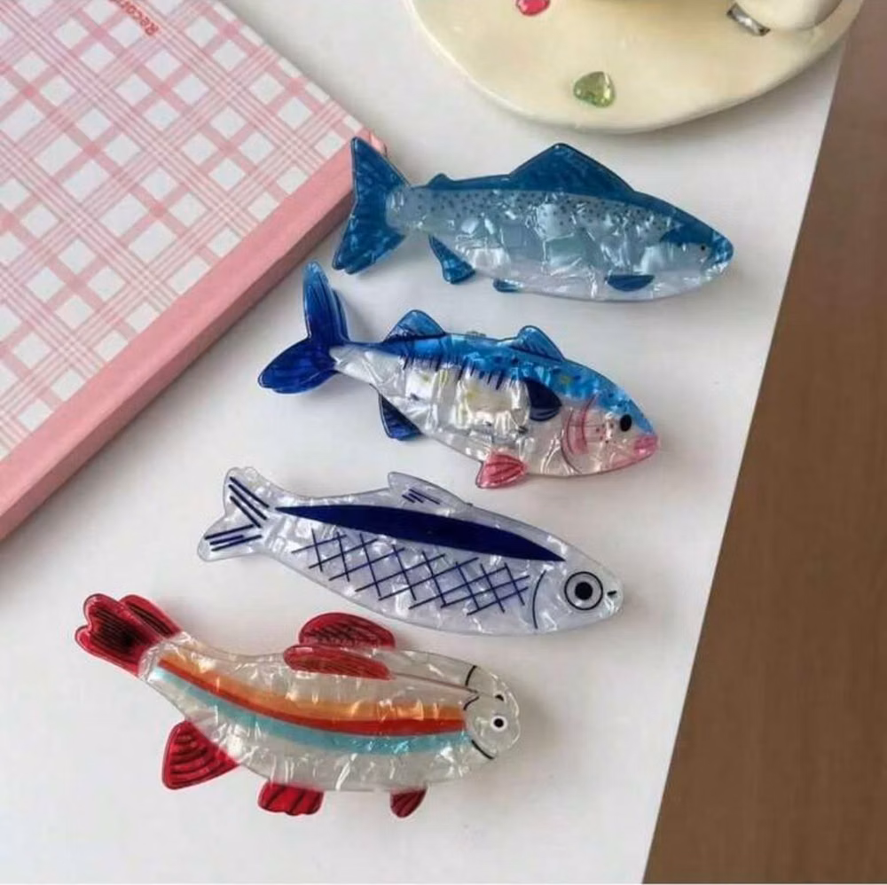 holographic fish charm macro photograph -