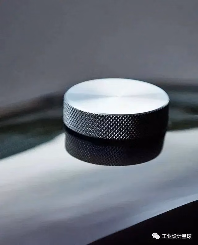 machined metal rotary knob macro photograph -