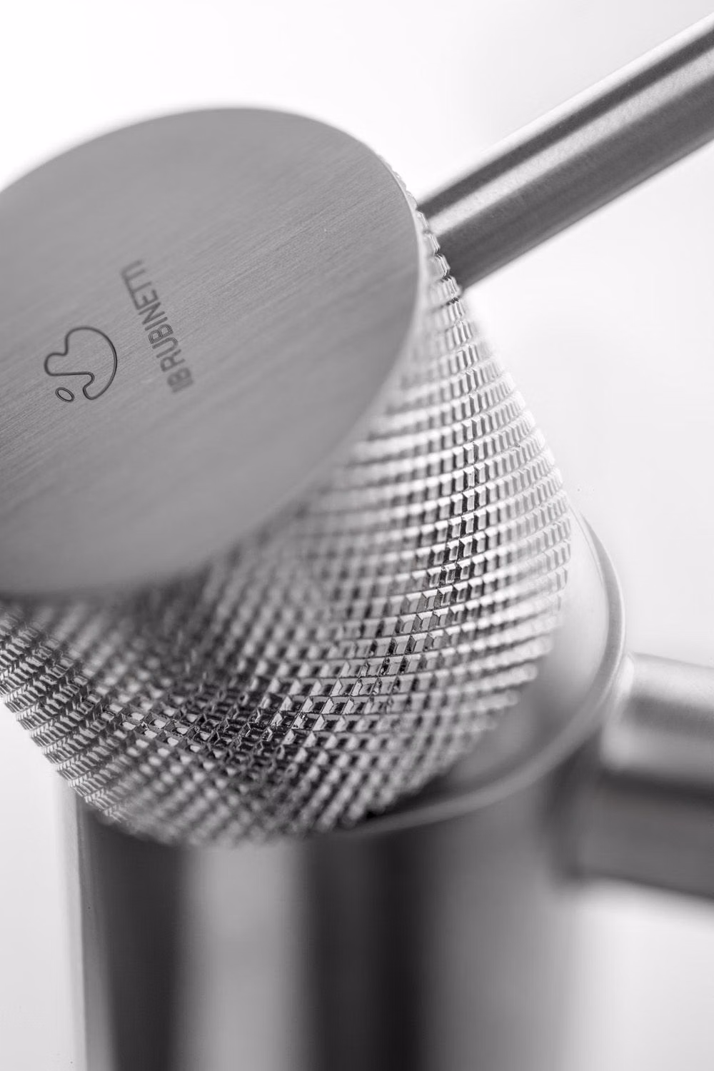 machined metal rotary knob macro photograph - 