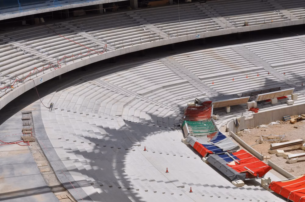 raw concrete stadium structure photograph -