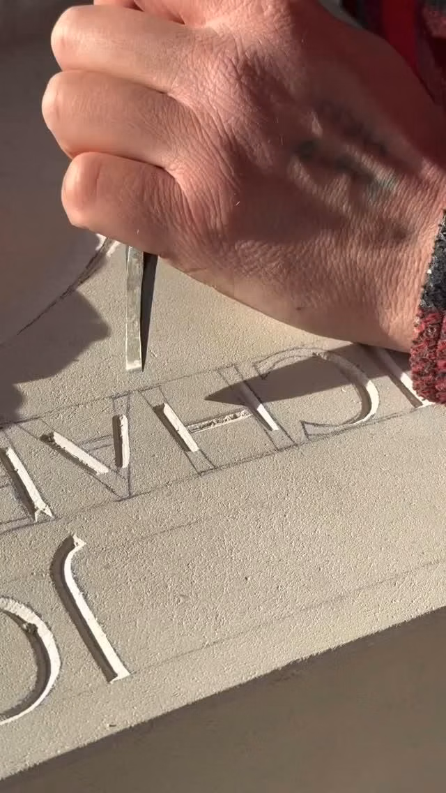carved stone inscription letters close up - Maker Spotlight: @joseph_hayton Chiseling stories one letter at a time. Watch as Joseph carves into Portland limestone with precision and patience—each cut revealing the quiet craft of stone lettering. #stonecarving #lettering #craftsmanship #carvingstone #stonemasonry #asmr #howitsmade