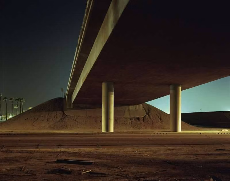 concrete highway overpass night photograph -