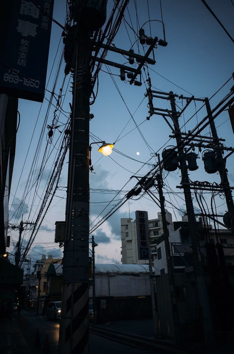 urban power lines night sky photograph -
