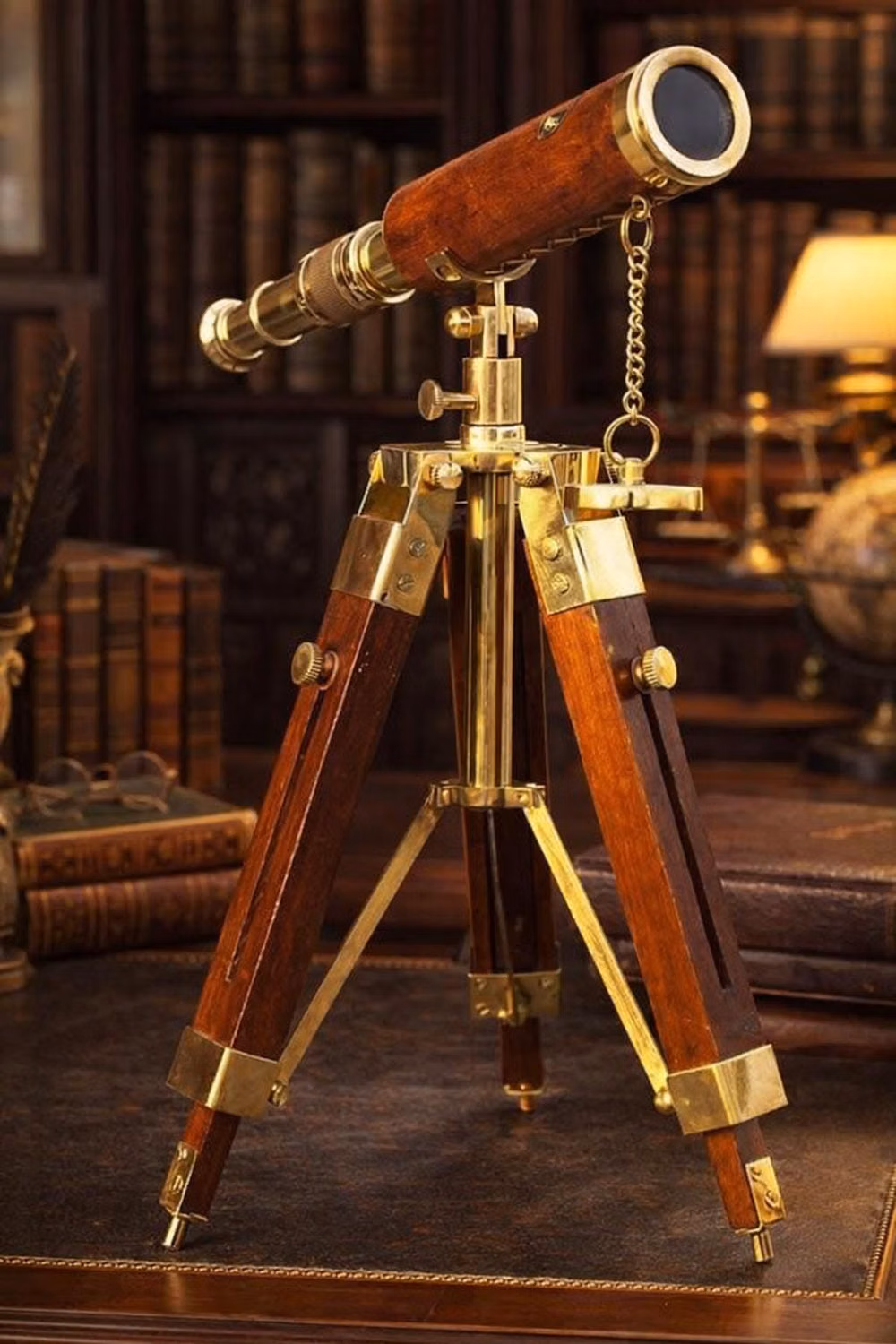 antique brass telescope close up photograph - Brand: BrassEraEmporium Size: 30.48 cm Material: Brass, Wood Color: As Show In Picture Theme: Nautical Net Quantity: 1 Count Brass Leather Telescope Nautical with Wooden Tripod Stand - Vintage Maritime Spyglass for Home Décor Gift, Bring timeless nautical charm into your home with this beautifully handcrafted Brass Leather Telescope with Wooden Tripod Stand. Inspired by classic maritime spyglasses used by sailors and explorers, this vintage-style telescope combines antique elegance with functional viewing power. Perfect as a home décor piece, office centerpiece, photography prop, or meaningful gift. Product Overview This nautical brass telescope is carefully crafted from solid brass and wrapped in premium leather for a rich, antique finish. The sturdy wooden tripod stand adds height, stab