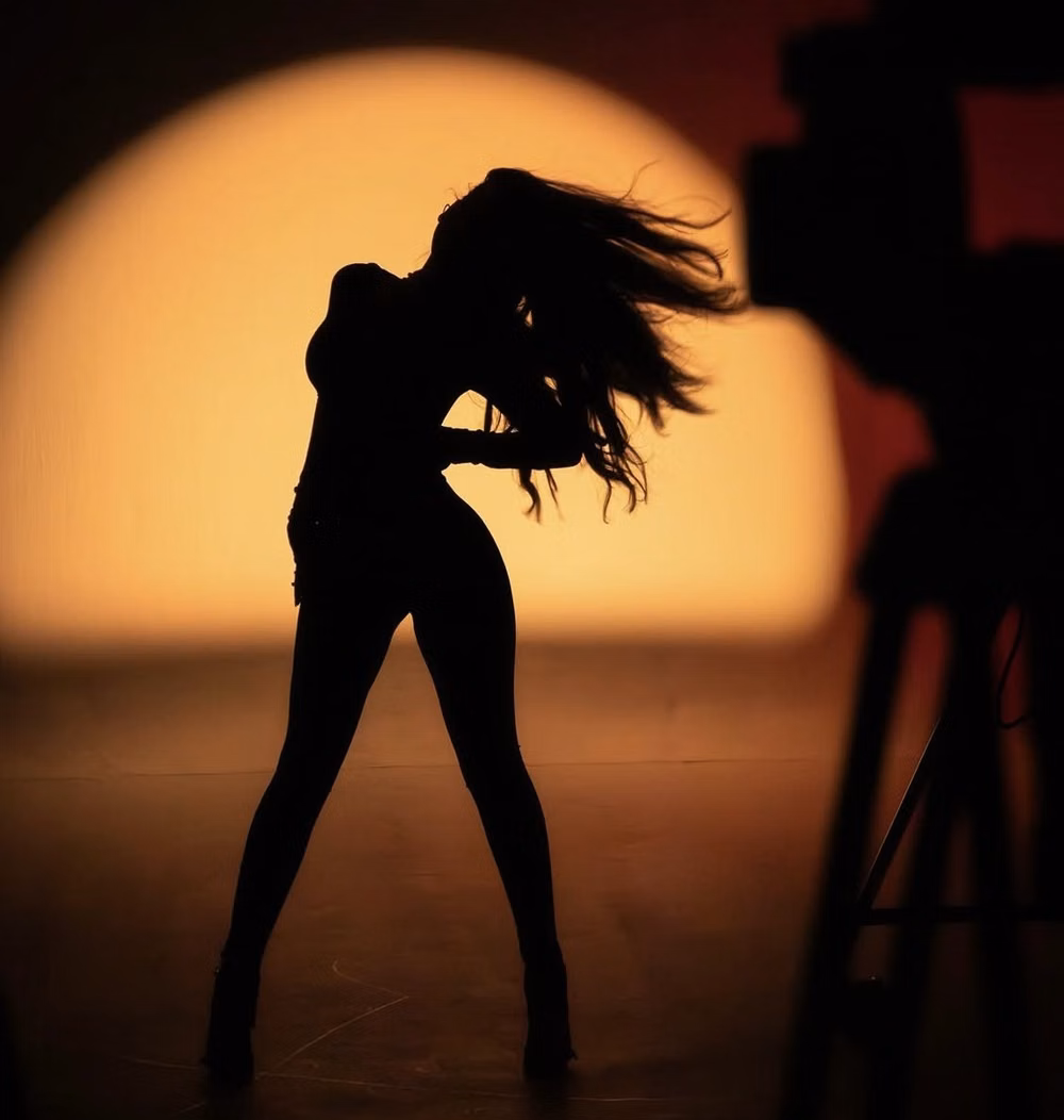 dancing person silhouette backlight photograph -