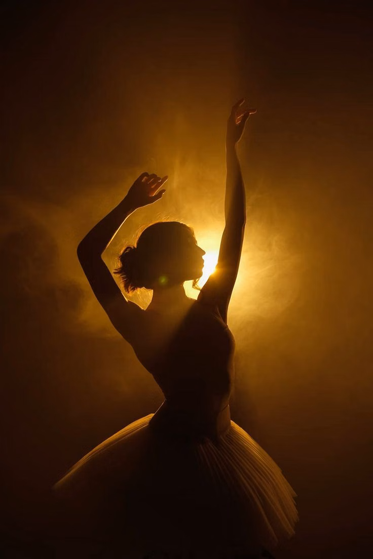 dancing person silhouette backlight photograph -