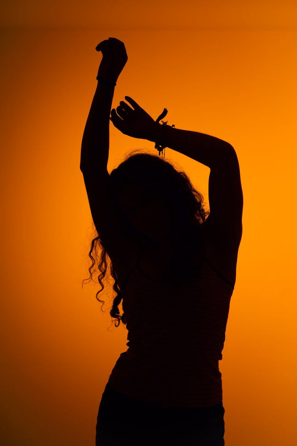 dancing person silhouette backlight photograph -