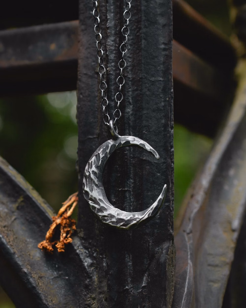 silver crescent moon jewelry close up photograph - π Lunar Necklace πβ β Victorian and Brutalist inspired crescent moon pendant necklace. Hard and textured, this necklace is both a perfect layering piece and also a statement necklace, amazing worn alone. β β Available in three chain lengths 16β/18β/20ββ β Slaughter Nostalgia jewelry is handmade in LA and has a lead time of 4-6 weeks.