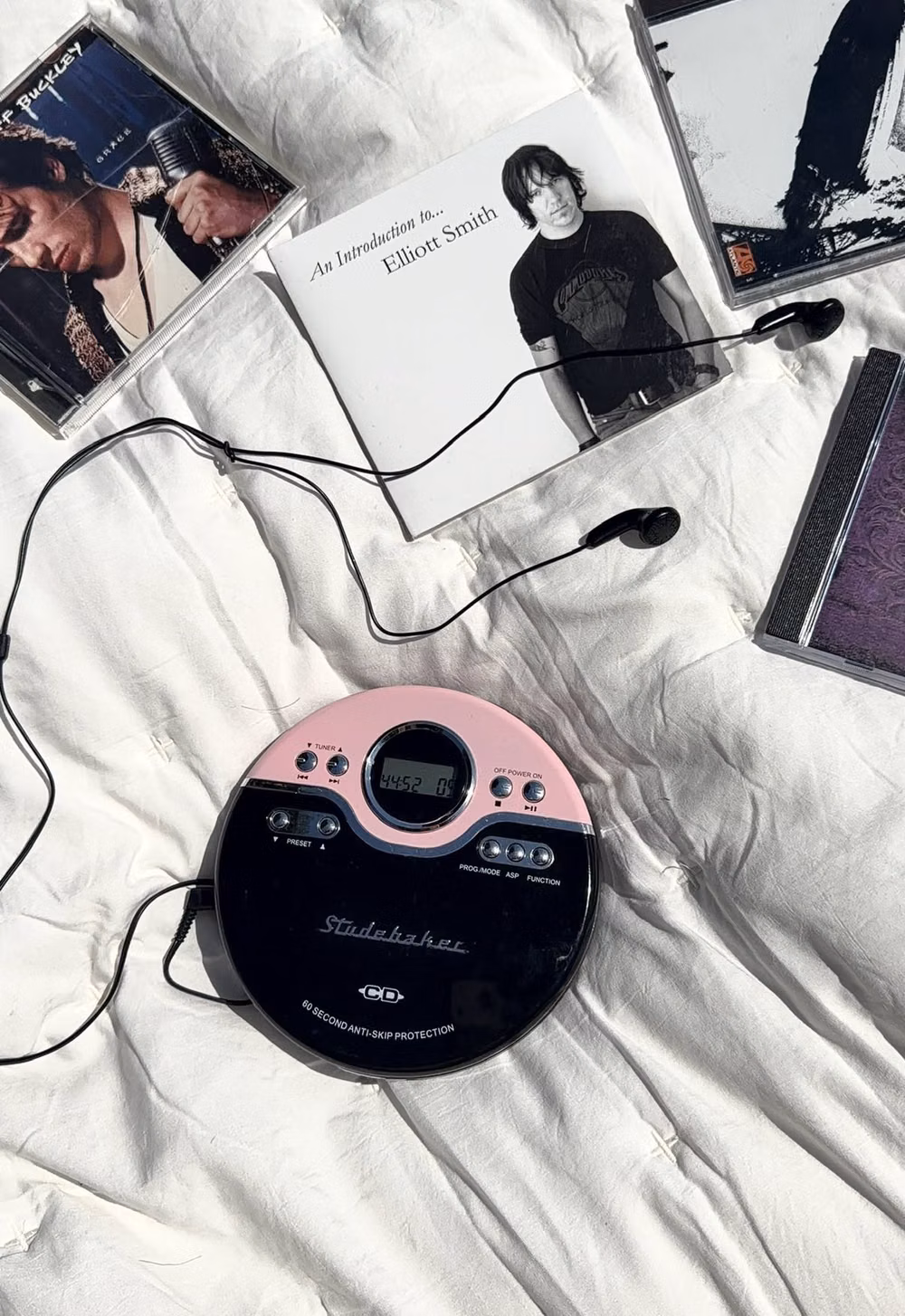 open CD player tray close up photograph - 